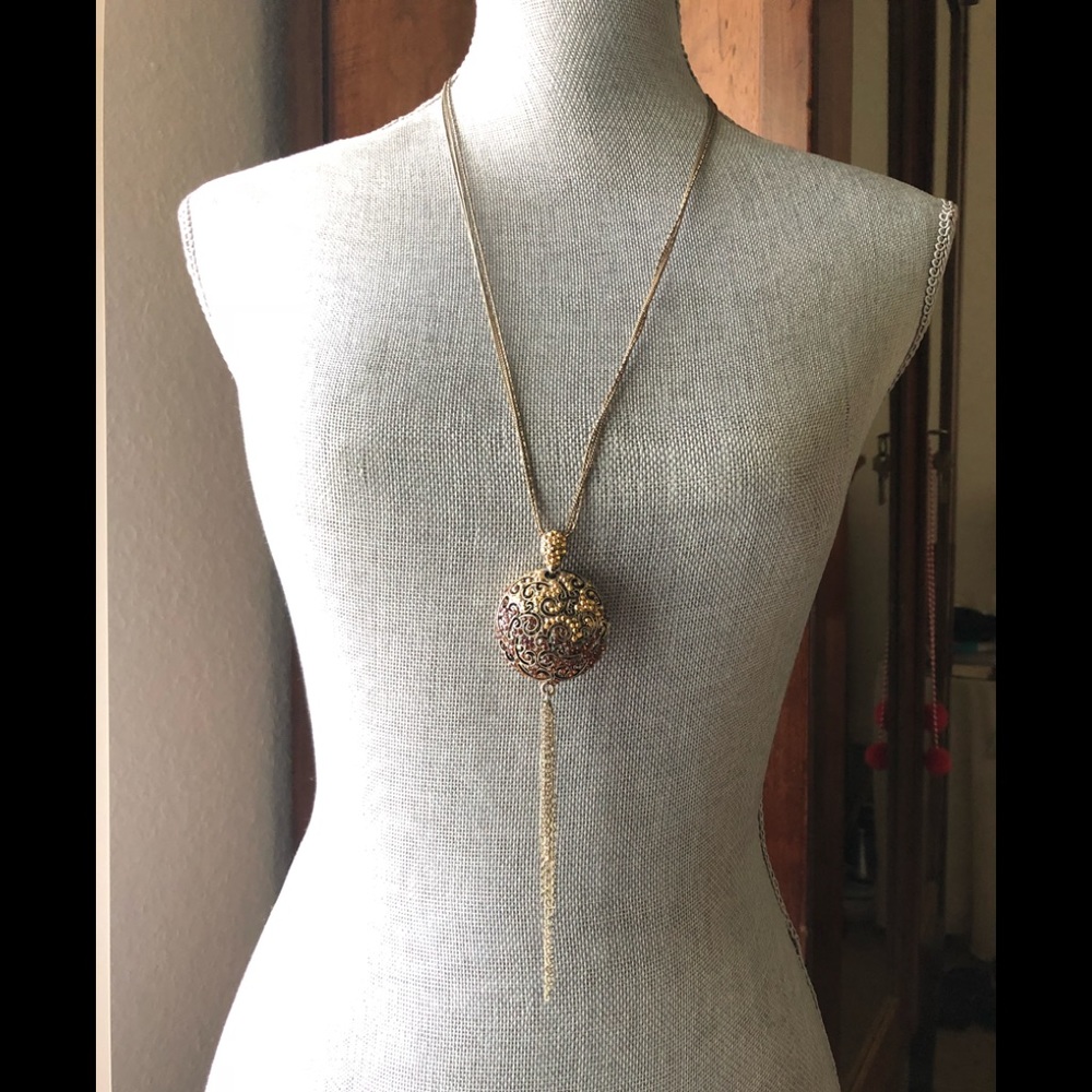 Beautiful Swarovski crystal faux locket w/ tassel